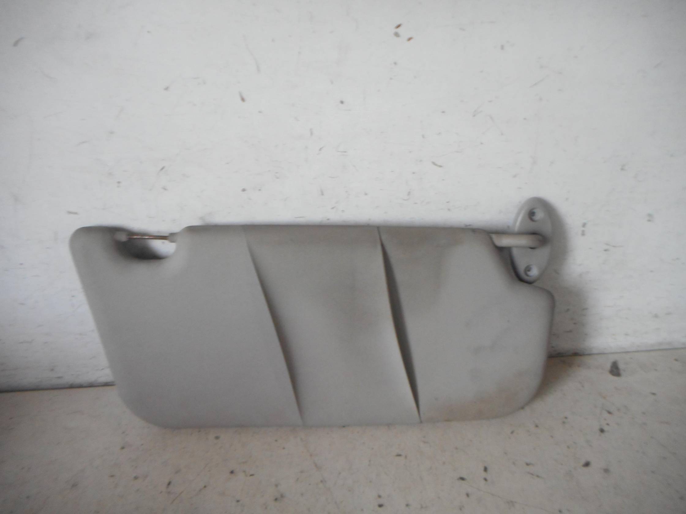 Aletta parasole parabrezza sx.